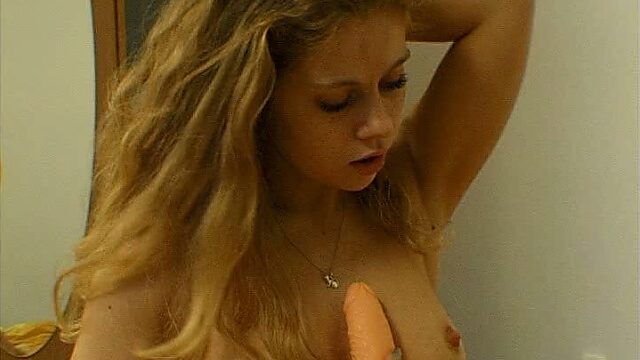 Busty tasty looking Russian amateur drills her cunt with dildo