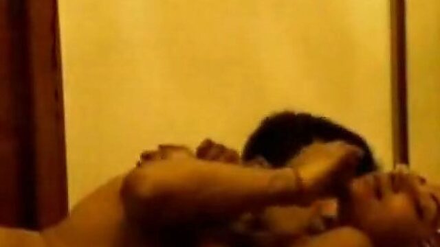 Sexually aroused desi strips and feels up his girl in amateur sex video