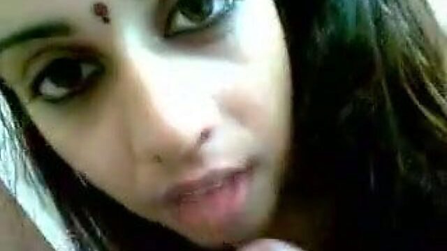 Great blowjob by the dark haired Indian bitch to her BF