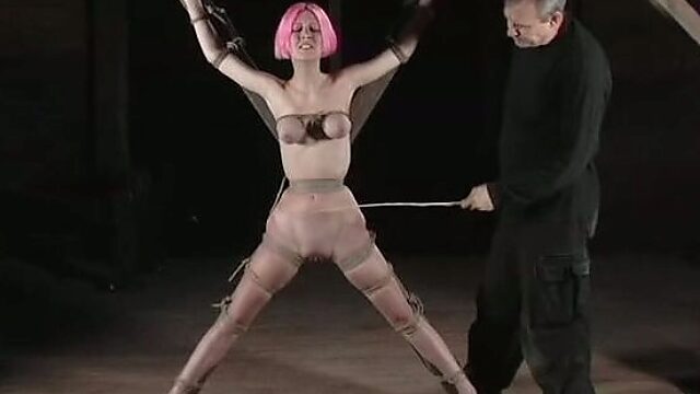 Bondage pink haired slut gets her small tits squeezed and tied up