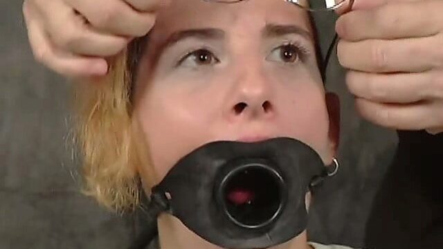 Dude puts the mask on sex-slave before punishing her throat