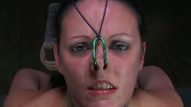 Nasal hooks and rope makes chick hurt in the dungeon