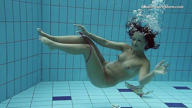 Hot swimming chick Krasula Fedorchuk takes off clothes under the water