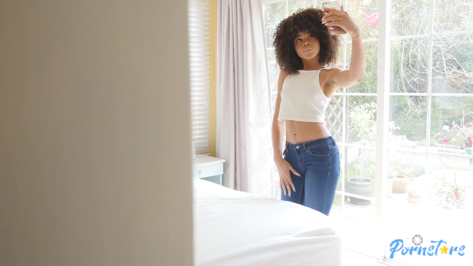 Ebony babe Arie Faye rides a dick and gets fucked doggy style