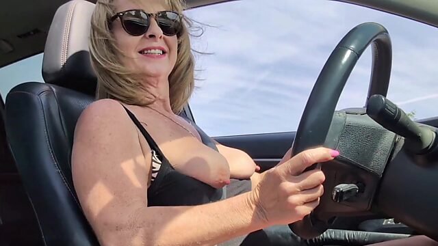 Horned-up granny with a pretty face masturbates on her road trip