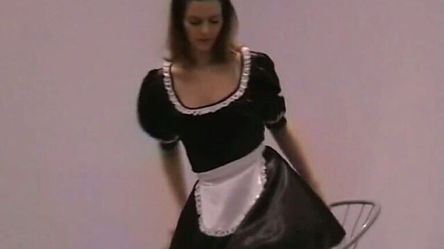 Radiating amateur girl is posing on cam wearing maids uniform